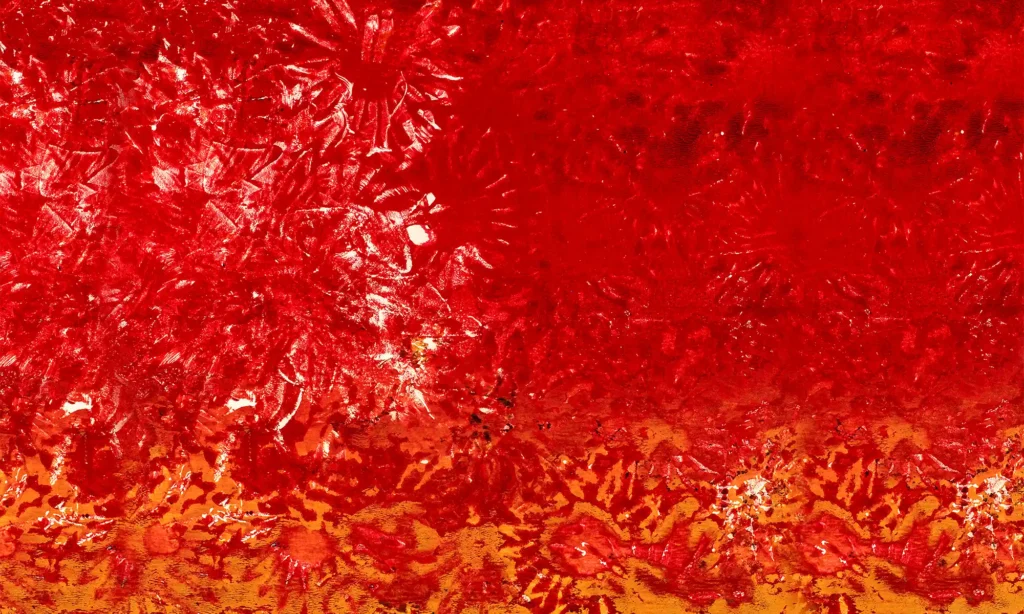 monoprint in gelb und rot mit floralen effekten